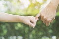 A mother and her child hooking their fingers Royalty Free Stock Photo