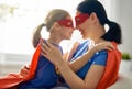 Girl and mom in Superhero costume Royalty Free Stock Photo