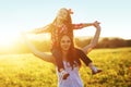 Mother with her child in spring field Royalty Free Stock Photo