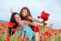 Mother with her child in spring field Royalty Free Stock Photo