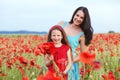 Mother with her child in spring field Royalty Free Stock Photo