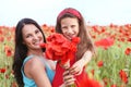 Mother with her child in spring field Royalty Free Stock Photo
