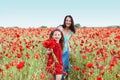 Mother with her child in spring field Royalty Free Stock Photo