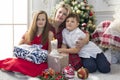 Mother with her children beautiful family with Christmas gifts Royalty Free Stock Photo