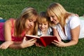 Mother with her children on the meadow Royalty Free Stock Photo