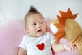 Mother and her children playing animal puppet on the bed room at home. Happy family concept Royalty Free Stock Photo