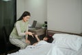 Mother and her cute little daughter having fun in bedroom. Family concept Royalty Free Stock Photo