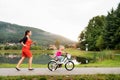 Mother and her cute little daughter in the nature. Royalty Free Stock Photo