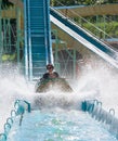 Mother and her daughter having fun in waterpark Royalty Free Stock Photo