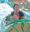 Mother and her daughter having fun in waterpark Royalty Free Stock Photo