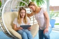 Mother and her daughter using tablet computer together Royalty Free Stock Photo