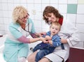 Mother with her little son on doctor examination Royalty Free Stock Photo