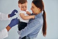 Mother with her little son is in the hospital with african american doctor Royalty Free Stock Photo