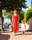 mother and her son with a basket of fruits and vegetables from farmers market Royalty Free Stock Photo