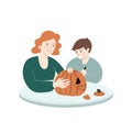 Mother and her son carving pumpkins for Halloween. Cute cartoon characters