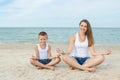 Mother and her son doing yoga Royalty Free Stock Photo