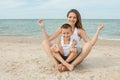 Mother and her son doing yoga Royalty Free Stock Photo