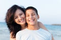 Mother with her son are having fun on the beach Royalty Free Stock Photo