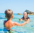 Mother with her son swimming in sea Royalty Free Stock Photo