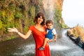 Mother with her son on a vacation at Anjos Waterfall, Madeira.