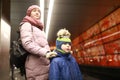 Mother with son waiting train Royalty Free Stock Photo