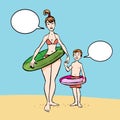 Mother with her son walking on a beach. Mother and son with swimming circle