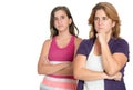 Mother and her teenage daughter sad and angry at each other Royalty Free Stock Photo