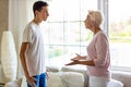 Mother and teenage son arguing at home Royalty Free Stock Photo