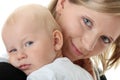 A mother and her tired cute baby boy Royalty Free Stock Photo