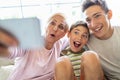 Mother with her two sons taking selfie