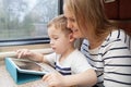 Mother and her young son on a train Royalty Free Stock Photo