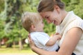 Mother hold baby on hands