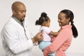 Mother holding baby for pediatrician to examine. Royalty Free Stock Photo