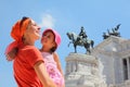 Mother is holding daughter, equestrian monument Royalty Free Stock Photo