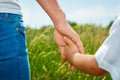 Mother holding hand of her son Royalty Free Stock Photo