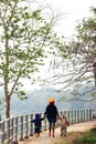 Mother holding hand her son walking together Royalty Free Stock Photo