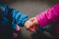 Mother holding hand of little daughter outdoors Royalty Free Stock Photo