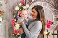 Mother holding her child. Mom playing with laughing kid. Family at home Royalty Free Stock Photo