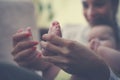 Mother holding in her hands baby feet. Royalty Free Stock Photo