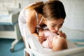 Mother holding her newborn baby child after labor in a hospital Royalty Free Stock Photo