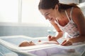 Mother holding her newborn baby child after labor in a hospital Royalty Free Stock Photo