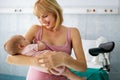 Mother holding her newborn baby child after labor in a hospital Royalty Free Stock Photo