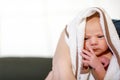 Mother holding her newborn baby daughter after birth on arms. Royalty Free Stock Photo