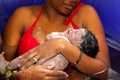 Mother Holding Her Newborn Baby After a Home Birth Royalty Free Stock Photo