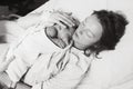 Mother holding her newborn baby after labor in a hospital. Royalty Free Stock Photo