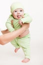 Mother holding little baby child boy making first step Royalty Free Stock Photo