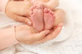 Mother holding little baby feet Royalty Free Stock Photo