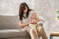 Mother holding baby wrapped in towel after bath Royalty Free Stock Photo