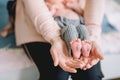 Baby`s foot in mother hands Royalty Free Stock Photo