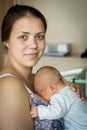 Mother holding newborn baby boy Royalty Free Stock Photo